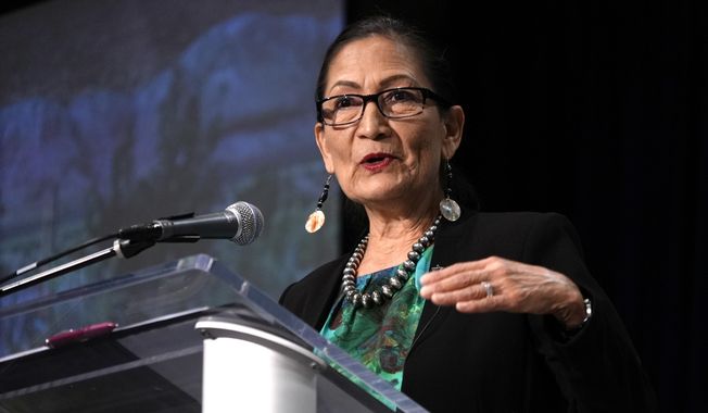 Interior Secretary Deb Haaland speaks at the Society of Environmental Journalists conference in Boise, Idaho, on Friday, April 21, 2023. (AP Photo/Brittany Peterson)