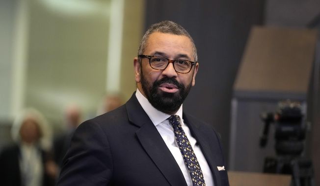 British Foreign Secretary James Cleverly arrives for a meeting of NATO foreign ministers at NATO headquarters in Brussels on April 5, 2023. Cleverly cut short a Pacific tour Friday, April 21, to return to Britain and deal with the deteriorating situation in Sudan. (AP Photo/Virginia Mayo, File)