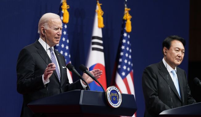 U.S. President Joe Biden, left, speaks as South Korean President Yoon Suk Yeol listens during a news conference at the People&#x27;s House inside the Ministry of National Defense, Saturday, May 21, 2022, in Seoul, South Korea. Biden will host South Korean President Yoon Suk Yeol for a state visit on Wednesday, April 26, 2023. (AP Photo/Evan Vucci) ** FILE **