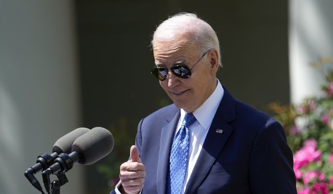 President Joe Biden gestures to the teacher from Delaware as he speaks during a ceremony honoring the Council of Chief State School Officers&#x27; 2023 Teachers of the Year in the Rose Garden of the White House, Monday, April 24, 2023 in Washington. (AP Photo/Susan Walsh)
