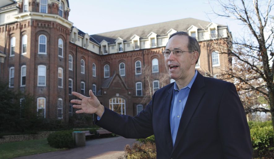 Former Ohio Gov. Bob Taft speaks during an interview on the campus of the University of Dayton on Dec. 21, 2011, in Dayton, Ohio. Taft urged state lawmakers on Monday, April 24, 2023, against advancing a measure that would make it harder to amend the state constitution or reviving August special elections to do it — calling the combination “especially bad public policy.” (Tony Jones/The Cincinnati Enquirer via AP) **FILE**
