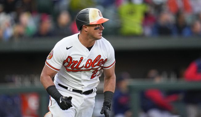 Baltimore Orioles&#x27; James McCann looks on as he flies out to Boston Red Sox center fielder Jarren Duran during the second inning of a baseball game, Monday, April 24, 2023, in Baltimore, Md. (AP Photo/Julio Cortez)