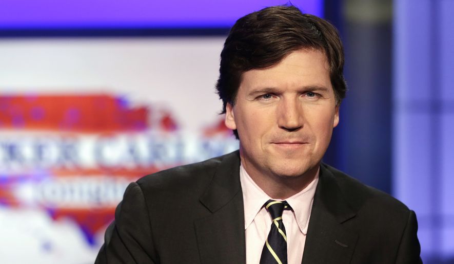 Tucker Carlson, host of &quot;Tucker Carlson Tonight,&quot; poses for photos in a Fox News Channel studio on March 2, 2017, in New York. Fox News says it has agreed to part ways with Tucker Carlson, less than a week after settling a lawsuit over the network’s 2020 election reporting. The network said in a press release Monday that the popular and controversial prime-time host&#x27;s last program aired on Friday. (AP Photo/Richard Drew, File)