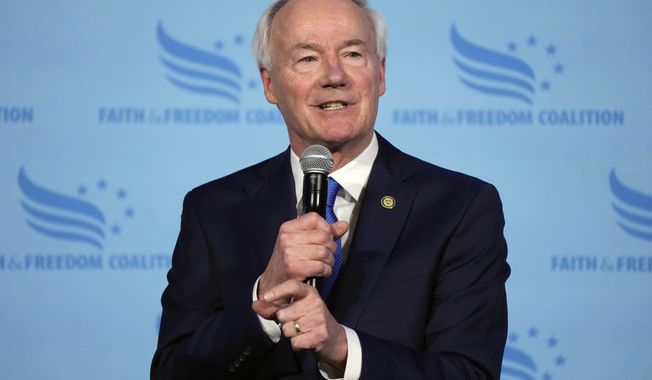 Republican presidential candidate and former Arkansas Gov. Asa Hutchinson speaks during the Iowa Faith and Freedom Coalition Spring Kick-Off, Saturday, April 22, 2023, in Clive, Iowa. (AP Photo/Charlie Neibergall)