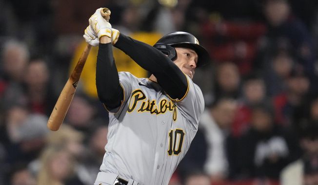 Pittsburgh Pirates&#x27; Bryan Reynolds watches the flight of his solo home run off Boston Red Sox starting pitcher Nick Pivetta during the third inning of a baseball game at Fenway Park, Tuesday, April 4, 2023, in Boston. Reynolds is sticking with the Pirates. The veteran outfielder has agreed to an eight-year deal worth $106.75 million three people with knowledge of the agreement told the Associated Press. They spoke to the AP on condition of anonymity because the deal was not official pending a physical.(AP Photo/Charles Krupa, File) **FILE**