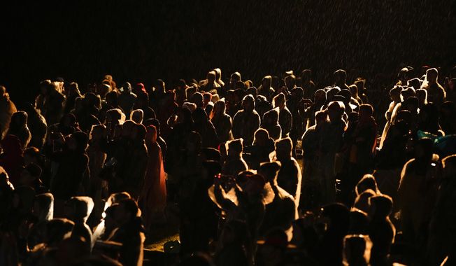 People gather to attend the Dawn Service ceremony at the Anzac Cove beach, the site of the April 25, 1915, World War I landing of the ANZACs (Australian and New Zealand Army Corps) on the Gallipoli peninsula, Turkey, early Tuesday, April 25, 2023. During the 108th Anniversary of Anzac Day, people from Australia and New Zealand joined Turkish and other nations&#x27; dignitaries at the former World War I battlefields for a dawn service Tuesday to remember troops that fought during the Gallipoli campaign between British-led forces against the Ottoman Empire army. (AP Photo/Emrah Gurel)