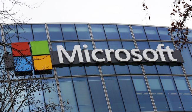 The Microsoft logo is pictured outside the headquarters in Paris, Jan. 8, 2021. British regulators have blocked Microsoft&#x27;s $69 billion deal to buy videogame maker Activision Blizzard over worries that it would stifle competition in the cloud gaming market. (AP Photo/Thibault Camus) **FILE**