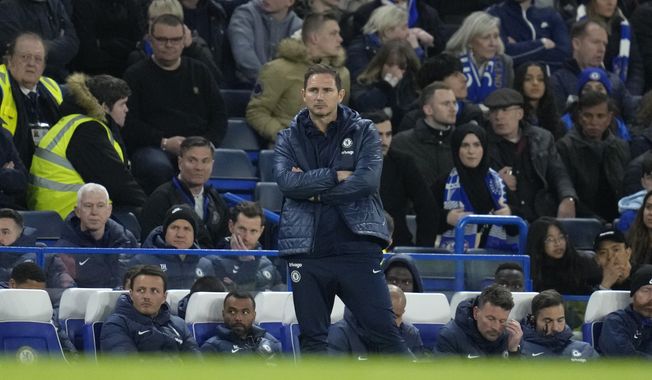 Chelsea&#x27;s interim head coach Frank Lampard stands by the touchline during the English Premier League soccer match between Chelsea and Brentford at Stamford Bridge stadium in London, Wednesday, April 26, 2023. (AP Photo/Kirsty Wigglesworth)