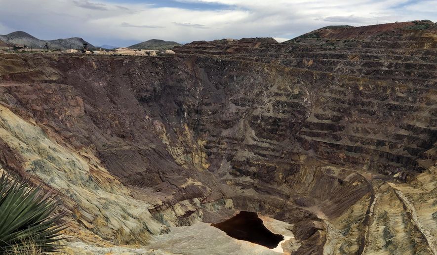 The Lavender pit mine, where a copper operation stopped in 1974, sits outside Bisbee, Ariz., on May 12, 2019. National conservation groups, tribes and others in Nevada are up in arms over a pro-mining bill Sen. Catherine Cortez Masto, D-Nev., introduced this week. It would insulate mining companies from a U.S. appeals court ruling that blocked a copper mine in Arizona and is now part of a legal battle over a big lithium mine near the Nevada-Oregon line. Allies on most other conservation issues, environmentalists are accusing Cortez Masto of becoming a puppet for the mining industry. (AP Photo/Anita Snow, File)