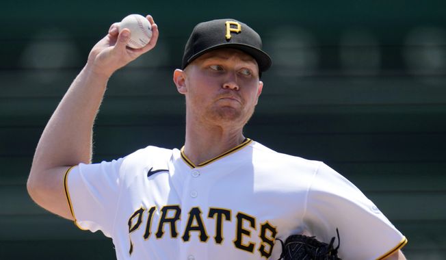 Pittsburgh Pirates starting pitcher Mitch Keller delivers during the third inning of a baseball game against the Los Angeles Dodgers in Pittsburgh, Thursday, April 27, 2023. (AP Photo/Gene J. Puskar)
