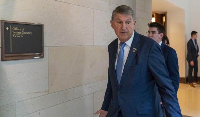 Sen. Joe Manchin, D-W.Va., arrives for a closed door briefing about the leaked highly classified military documents, on Capitol Hill, Wednesday, April 19, 2023, in Washington. (AP Photo/Alex Brandon)