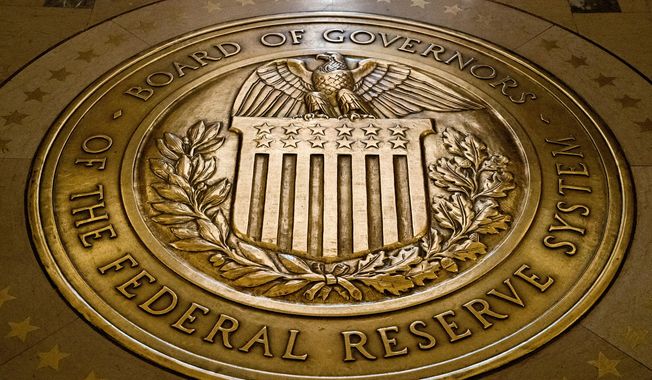 The seal of the Board of Governors of the United States Federal Reserve System is displayed in the ground at the Marriner S. Eccles Federal Reserve Board Building in Washington, Feb. 5, 2018. The Federal Reserve is scheduled Friday to release a highly-anticipated review of its supervision of Silicon Valley Bank, the go-to bank for venture capital firms and technology start-ups that failed spectacularly in March. (AP Photo/Andrew Harnik, File)