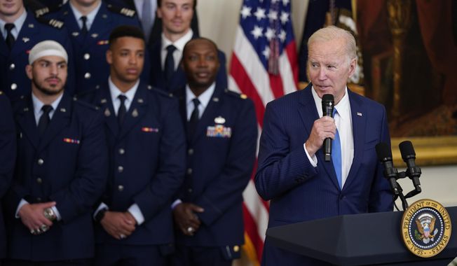 President Joe Biden speaks during an event to present the Commander-in-Chief&#x27;s trophy to the Air Force Academy in the East Room of the White House, Friday, April 28, 2023, in Washington. (AP Photo/Evan Vucci)