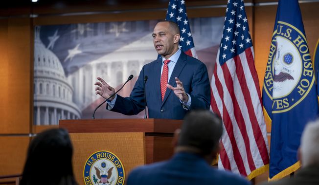 House Minority Leader Hakeem Jeffries, D-N.Y., the top Democrat in the House, speaks with reporters at the Capitol in Washington, Friday, April 28, 2023. (AP Photo/J. Scott Applewhite)