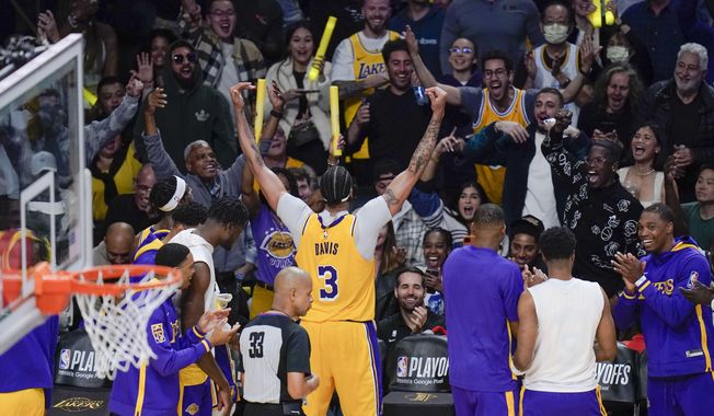 Los Angeles Lakers&#x27; Anthony Davis (3) fires up the fans during the second half in Game 6 of the team&#x27;s first-round NBA basketball playoff series against the Memphis Grizzlies on Friday, April 28, 2023, in Los Angeles. (AP Photo/Jae C. Hong) **FILE**