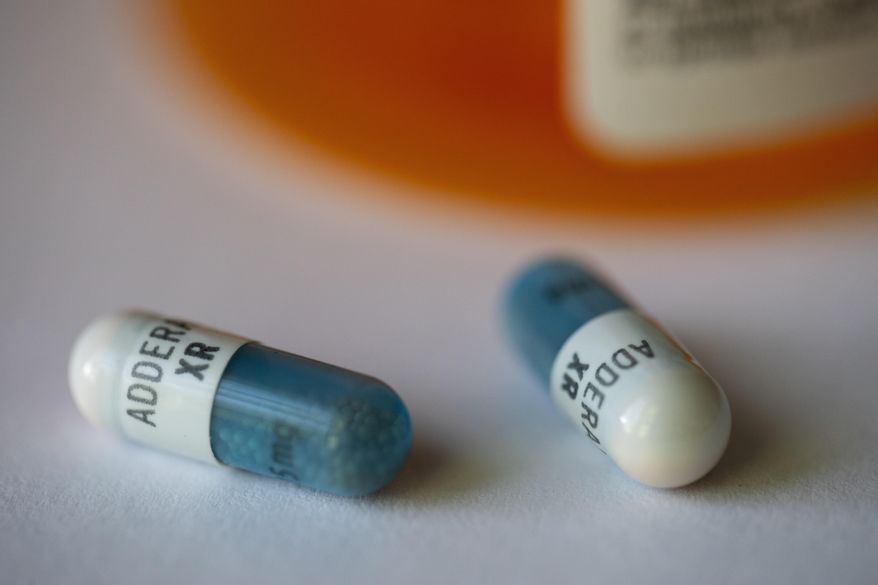 Adderall XR capsules are displayed on Feb. 24, 2023. (AP Photo/Jenny Kane, File)
