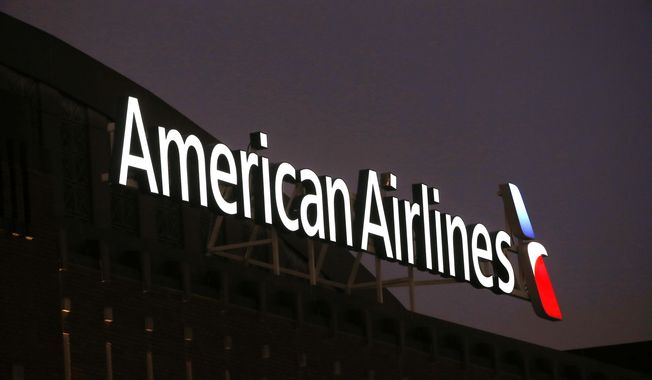 The American Airlines logo on top of the American Airlines Center in Dallas, Texas, is pictured on Dec. 19, 2017. Pilots at American Airlines are voting to authorize a strike. That doesn&#x27;t mean they&#x27;re going to walk off the job anytime soon, but it does aim to put more pressure on the airline to reach a new contract with the pilots&#x27; union. The union said Monday, May 1, 2023 that almost all its members took part in the voting, and that 99% of those who voted authorized the union to call for a strike. (AP Photo/Michael Ainsworth, File)