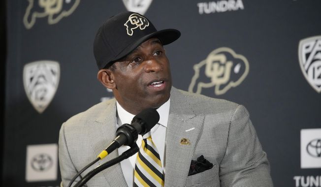 Deion Sanders speaks after being introduced as the new head football coach at the University of Colorado during a news conference Sunday, Dec. 4, 2022, in Boulder, Colo. The spring transfer window for college football players closed with 43 scholarship players -- the equivalent of half a roster -- from coach Deion Sanders&#x27; Colorado program having entered the portal since the spring game was played on April 15. (AP Photo/David Zalubowski) **FILE**