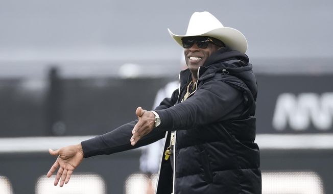 Colorado head coach Deion Sanders gestures in the first half of the team&#x27;s spring practice NCAA college football game Saturday, April 22, 2023, in Boulder, Colo. The spring transfer window for college football players closed with 43 scholarship players -- the equivalent of half a roster -- from coach Deion Sanders&#x27; Colorado program having entered the portal since the spring game was played on April 15. (AP Photo/David Zalubowski, File) **FILE**
