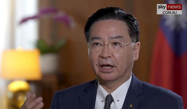 In this image made from video provided by Sky News Australia, Taiwan&#x27;s Foreign Minister Joseph Wu speaks in an interview in Taipei, Taiwan, on April 28, 2023. Taiwan intends to fight for itself in any armed conflict with China and is unclear as to what countries might stand beside it, the self-governing island&#x27;s foreign minister said. (Sky News Australia via AP)