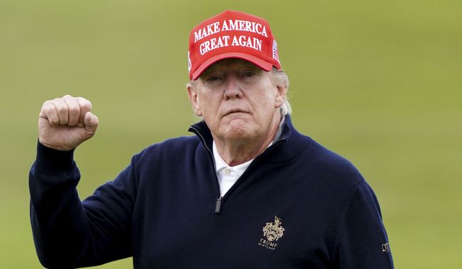 Former U.S. president Donald Trump plays golf at Turnberry golf course, Scotland, during his visit to the U.K., Tuesday May 2, 2023. (Jane Barlow/PA via AP)