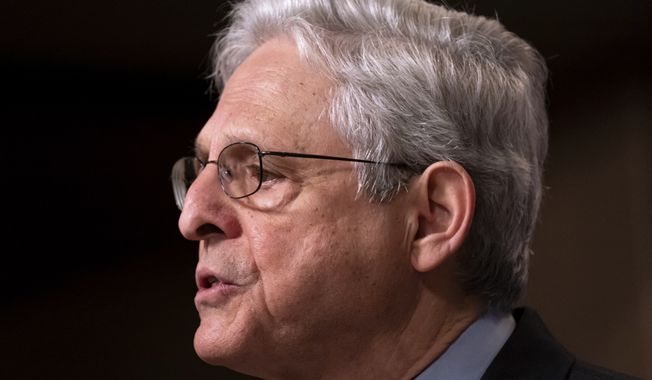 Attorney General Merrick Garland announces an international law enforcement operation targeting fentanyl and opioid traffickers on the Darknet during a news conference at the Department of Justice, Tuesday, May 2, 2023, in Washington. (AP Photo/Nathan Howard)
