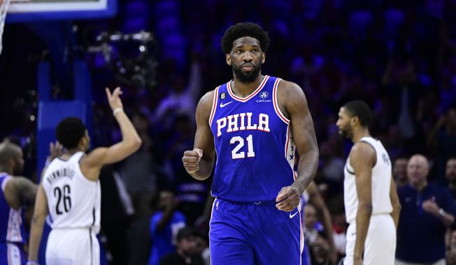 Philadelphia 76ers&#x27; Joel Embiid reacts after a score by Tobias Harris in the first half during Game 2 in the first round of the NBA basketball playoffs against the Brooklyn Nets, Monday, April 17, 2023, in Philadelphia. (AP Photo/Derik Hamilton) **FILE**