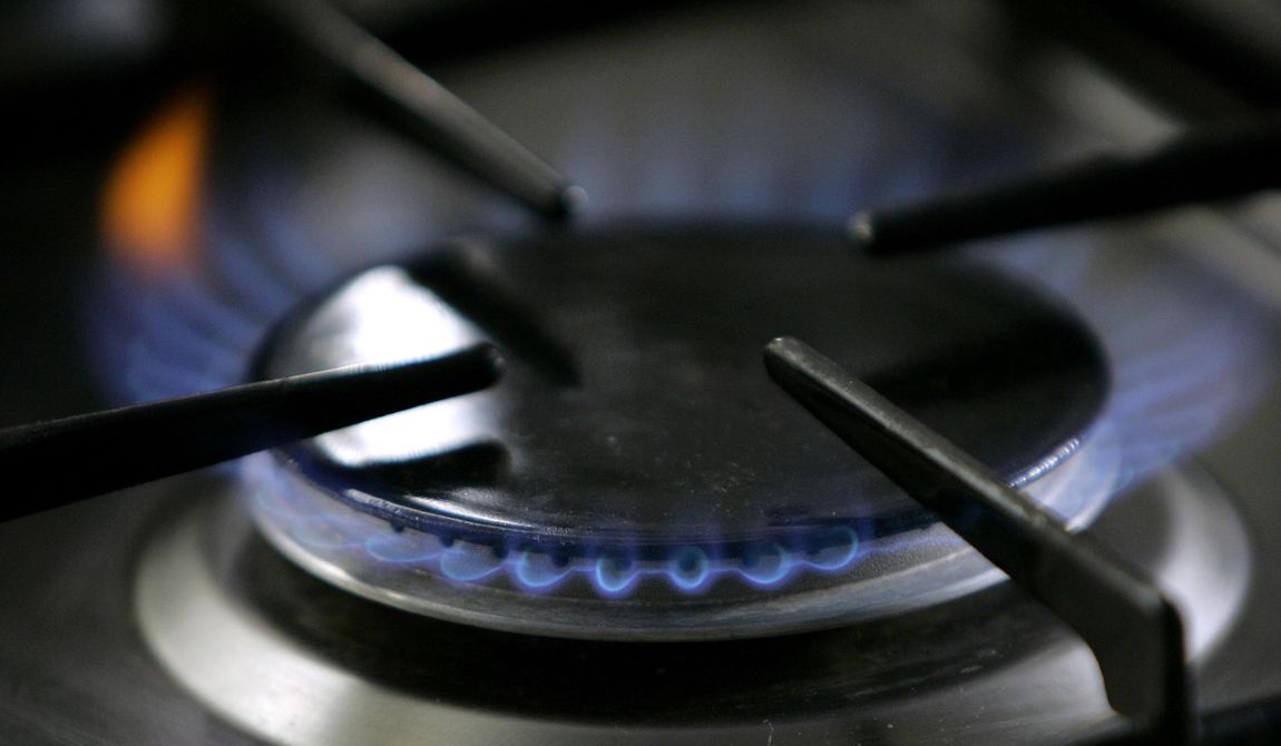 A gas-lit flame burns on a natural gas stove, Jan. 11, 2006, in Stuttgart, Germany. New York state plans to ban natural gas stoves and furnaces in most new buildings, a policy aimed at reducing greenhouse gas emissions without making people replace their beloved cooking equipment. (AP Photo/Thomas Kienzle, File)
