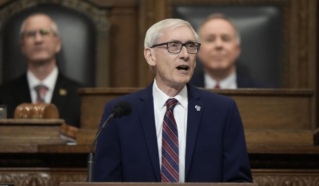 Wisconsin Gov. Tony Evers speaks during the annual State of the State address, Jan. 24, 2023, in Madison, Wis. Legalizing marijuana, paying for renovations at the Milwaukee Brewers&#x27; stadium and creating a paid family leave program are among the more than 500 items proposed by Gov. Evers that the Legislature&#x27;s Republican-controlled budget committee plans to kill with a single vote on Tuesday, May 2. (AP Photo/Morry Gash, File)