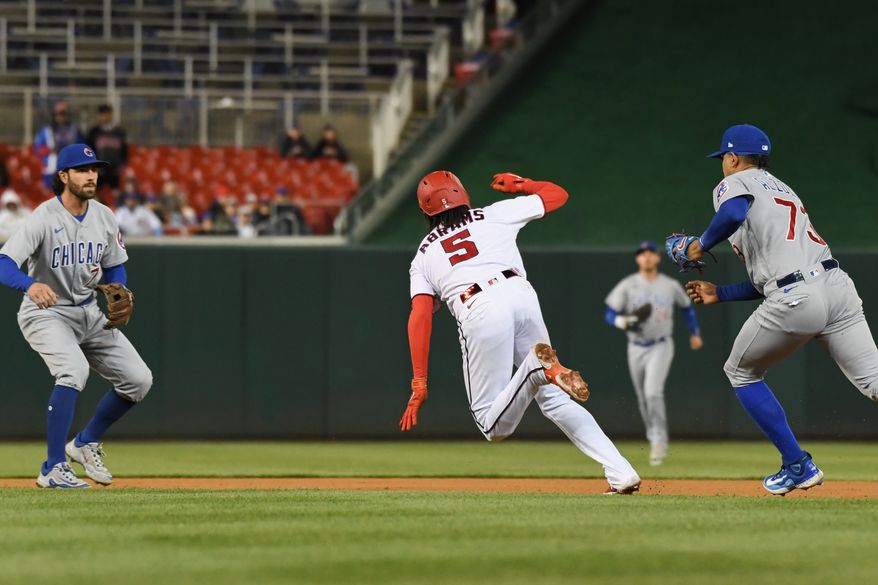 Washington Nationals shortstop C.J. Abrams (5) getting caught in a run down during the seventh inning of an MLB game against the Chicago Cubs at Nationals Park in Washington D.C., May 3, 2023. (Photo by Billy Sabatini/All-Pro Reels)