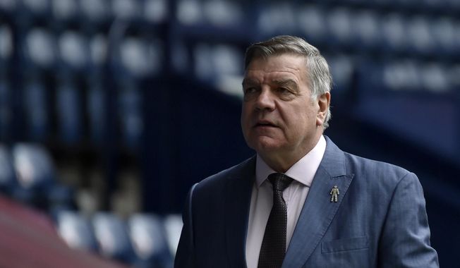 West Bromwich Albion&#x27;s manager Sam Allardyce walks before the English Premier League soccer match between West Bromwich Albion and Liverpool at the Hawthorns stadium in West Bromwich, England, Sunday, May 16, 2021. Sam Allardyce has made an unlikely return to Premier League management. The 68-year-old former England coach has been hired by Leeds until the end of the season after the relegation-threatened club fired Javi Gracia. (AP Photo/Rui Vieira, Pool, File)