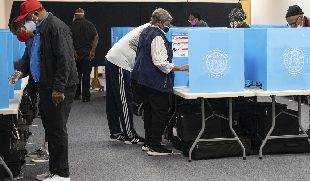 NextImg:Kemp signs bill to ban outside election cash in Georgia
