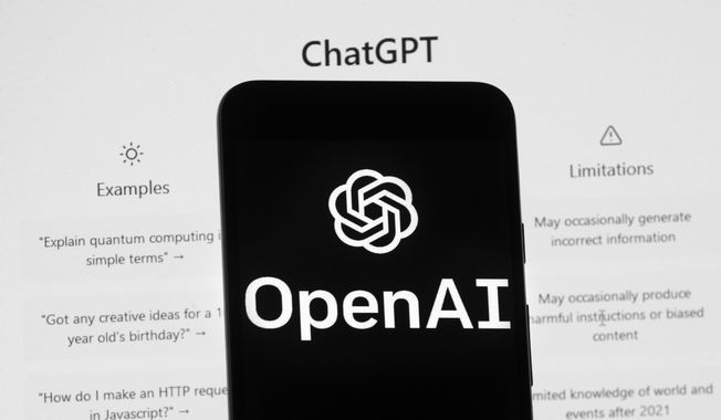 The OpenAI logo is seen on a mobile phone in front of a computer screen which displays the ChatGPT home screen, on March 17, 2023, in Boston. Britain’s competition watchdog is opening a review of the artificial intelligence market, focusing on the technology underpinning chatbots like ChatGPT. (AP Photo/Michael Dwyer, File)