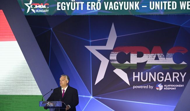 Hungarian Prime Minister Viktor Orban delivers the keynote speech at the opening session of Hungary Conservative Political Action Conference Hungary in Budapest, Hungary, Thursday, May 4, 2023. The two-day CPAC meeting organized by Center for Fundamental Rights of Hungary features some 60 prestigious foreign speakers from 20 countries and five continents. (Szilard Koszticsak/MTI via AP)