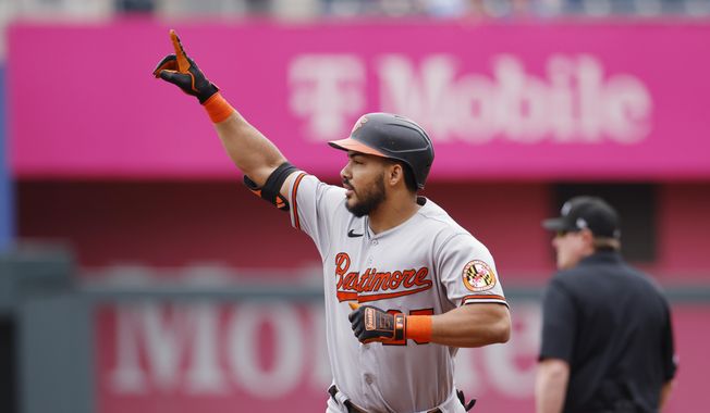 Baltimore Orioles&#x27;s Anthony Santander reacts as he rounds the bases after hitting a two-run home run during the first inning of a baseball game against the Kansas City Royals in Kansas City, Mo., Thursday, May 4, 2023. (AP Photo/Colin E. Braley)