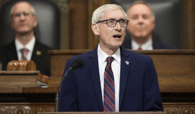 Wisconsin Gov. Tony Evers speaks during the annual State of the State address on Jan. 24, 2023, in Madison, Wis. Evers promised Thursday, May 4, 2023, to veto a wide-ranging Republican plan to bolster aid to local governments, saying the measure moving rapidly through the GOP-controlled Legislature doesn&#x27;t give enough unrestricted money to communities struggling to pay for police, fire and other services. (AP Photo/Morry Gash) **FILE**