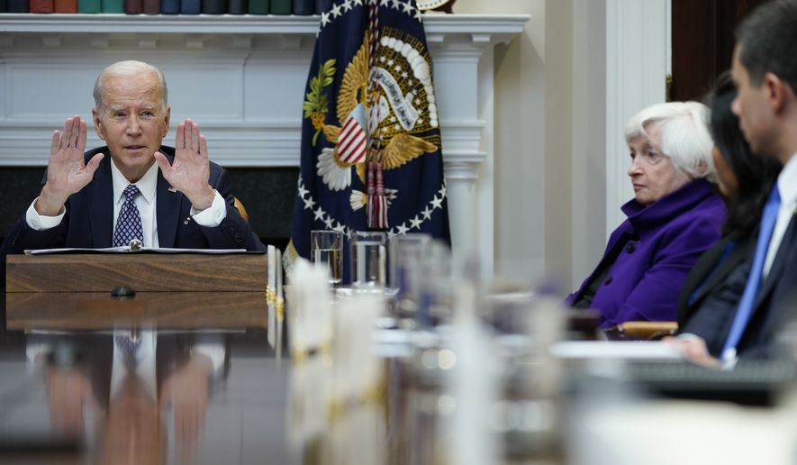 President Joe Biden speaks during a meeting with his "Investing in America Cabinet," in the Roosevelt Room of the White House, Friday, May 5, 2023, in Washington. Treasury Secretary Janet Yellen listens at right. (AP Photo/Evan Vucci)