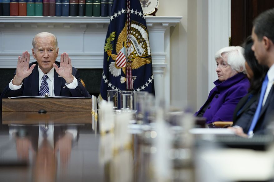 President Joe Biden speaks during a meeting with his "Investing in America Cabinet," in the Roosevelt Room of the White House, Friday, May 5, 2023, in Washington. Treasury Secretary Janet Yellen listens at right. (AP Photo/Evan Vucci)