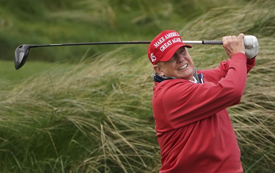 Then-former U.S. President Donald Trump plays golf at Trump International Golf Links & Hotel in Doonbeg, Ireland, Thursday, May 4, 2023, during his visit to Ireland. (Brian Lawless/PA via AP) ** FILE **
