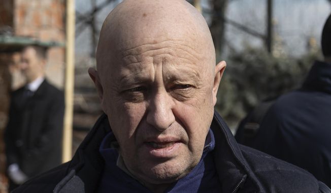 Yevgeny Prigozhin, the owner of the Wagner Group military company, arrives during a funeral ceremony at the Troyekurovskoye cemetery in Moscow, Russia, Saturday, April 8, 2023. Prigozhin is threatening to pull his troops out of the protracted battle for the eastern Ukraine city of Bakhmut next week. He accused Russia’s military command Friday, May 5 of starving his forces of ammunition and rendering them unable to fight. (AP Photo, file)