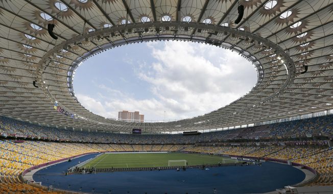 A general view at the Olympic national stadium in Kyiv, Ukraine, June 10, 2012. In Ukraine and Turkey, the national soccer league titles can be decided in showdown games this month between the top two teams in the standings. That the leagues are set to be completed at all is remarkable. (AP Photo/Andrey Lukatsky, File)