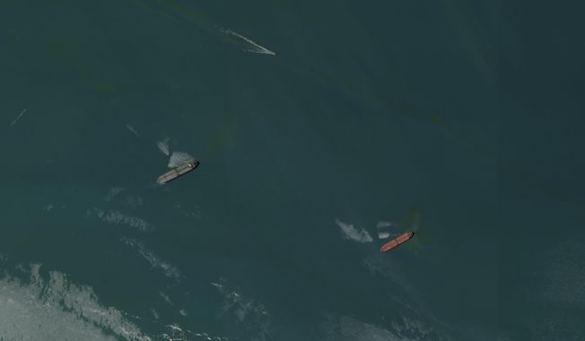This satellite image from Planet Labs PBC shows the seized oil tankers Niovi, left, and Advantage Sweet, right, off the coast of Bandar Abbas, Iran, Saturday, May 6, 2023. Satellite images analyzed Sunday, May 7, 2023, by The Associated Press showed the location of two oil tankers recently seized by Iran amid tensions with the West. (Planet Labs PBC via AP)