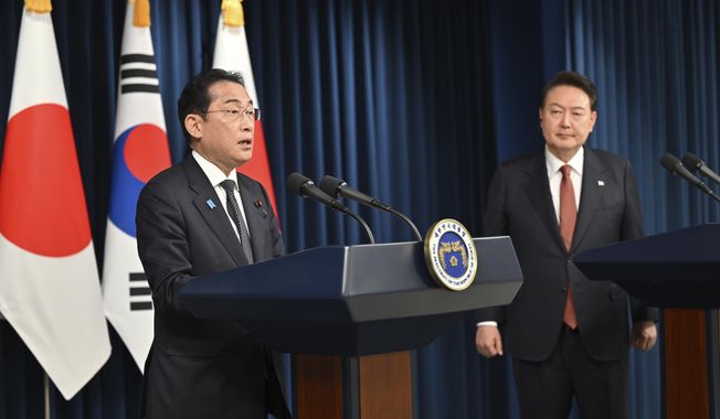 South Korean President Yoon Suk Yeol, right, and Japanese Prime Minister Fumio Kishida attend a joint press conference after their meeting at the presidential office in Seoul Sunday, May 7, 2023. The leaders of South Korea and Japan met Sunday for their second summit in less than two months, as they push to mend long-running historical grievances and boost ties in the face of North Korea’s nuclear program and other regional challenges. (Jung Yeon-je/Pool Photo via AP)