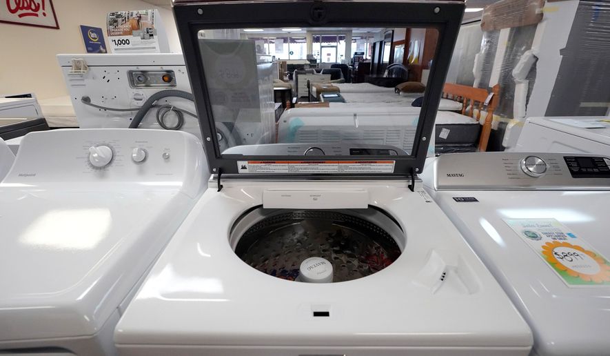 Washing machines are displayed with other appliances at Sam&#x27;s Appliances TV &amp; Furniture, Thursday, March 25, 2021, in Norwood, Mass. (AP Photo/Steven Senne) **FILE**
