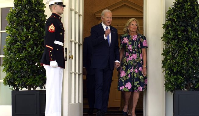 President Joe Biden, accompanied by first lady Jill Biden, walks from the Oval Office to attend a ceremony honoring the Council of Chief State School Officers&#x27; 2023 Teachers of the Year in the Rose Garden of the White House, Monday, April 24, 2023 in Washington. (AP Photo/Susan Walsh)