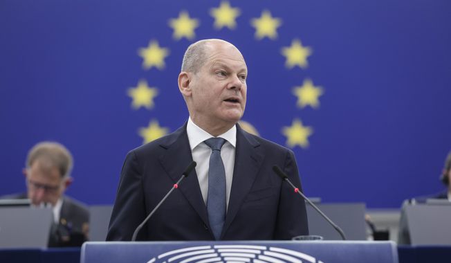 German Chancellor Olaf Scholz delivers his speech during a debate about Europe, Tuesday, May 9, 2023 at the European Parliament in Strasbourg, eastern France. (AP Photo/Jean-Francois Badias)