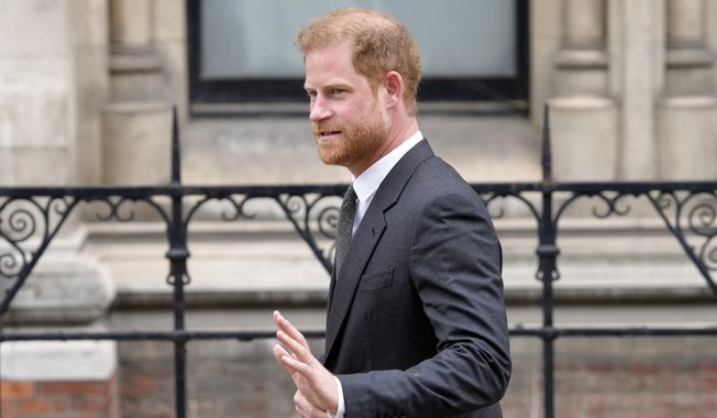 Britain&#x27;s Prince Harry leaves the Royal Courts of Justice in London, March 30, 2023. (AP Photo/Kirsty Wigglesworth, File)