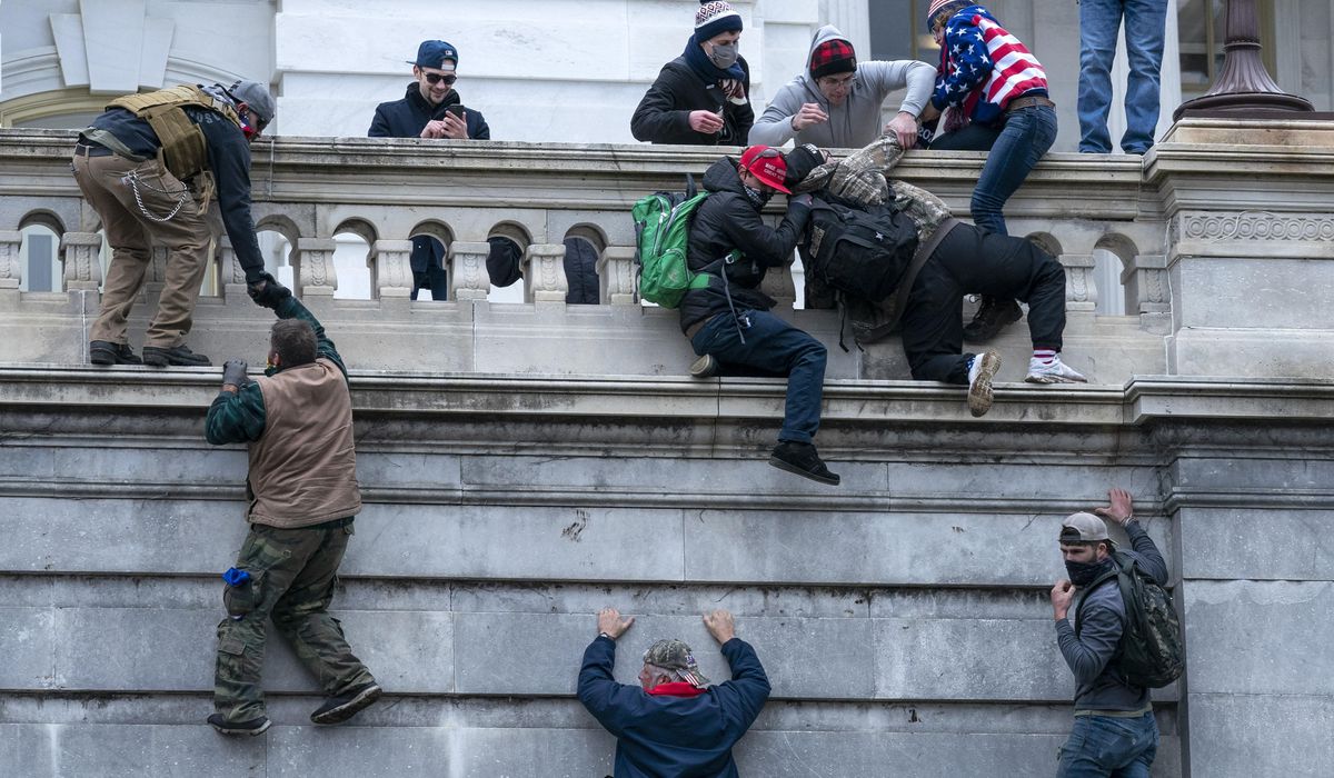 NextImg:Idaho man who dangled from Senate balcony during Capitol riot receives 15-month prison sentence