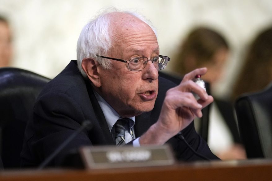 Senate Health, Education, Labor and Pensions Committee Chair Sen. Bernie Sanders, I-Vt., holds up an insulin product during the Senate Health, Education, Labor, and Pensions Committee hearing on Capitol Hill in Washington, Wednesday, May 10, 2023, to examine the need to make insulin affordable for all Americans. (AP Photo/Carolyn Kaster)
