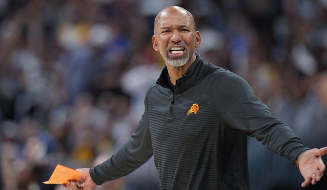 Phoenix Suns coach Monty Williams argues for a call during the second half of Game 5 of the team&#x27;s NBA Western Conference basketball semifinal playoff series against the Denver Nuggets on Tuesday, May 9, 2023, in Denver. (AP Photo/David Zalubowski)